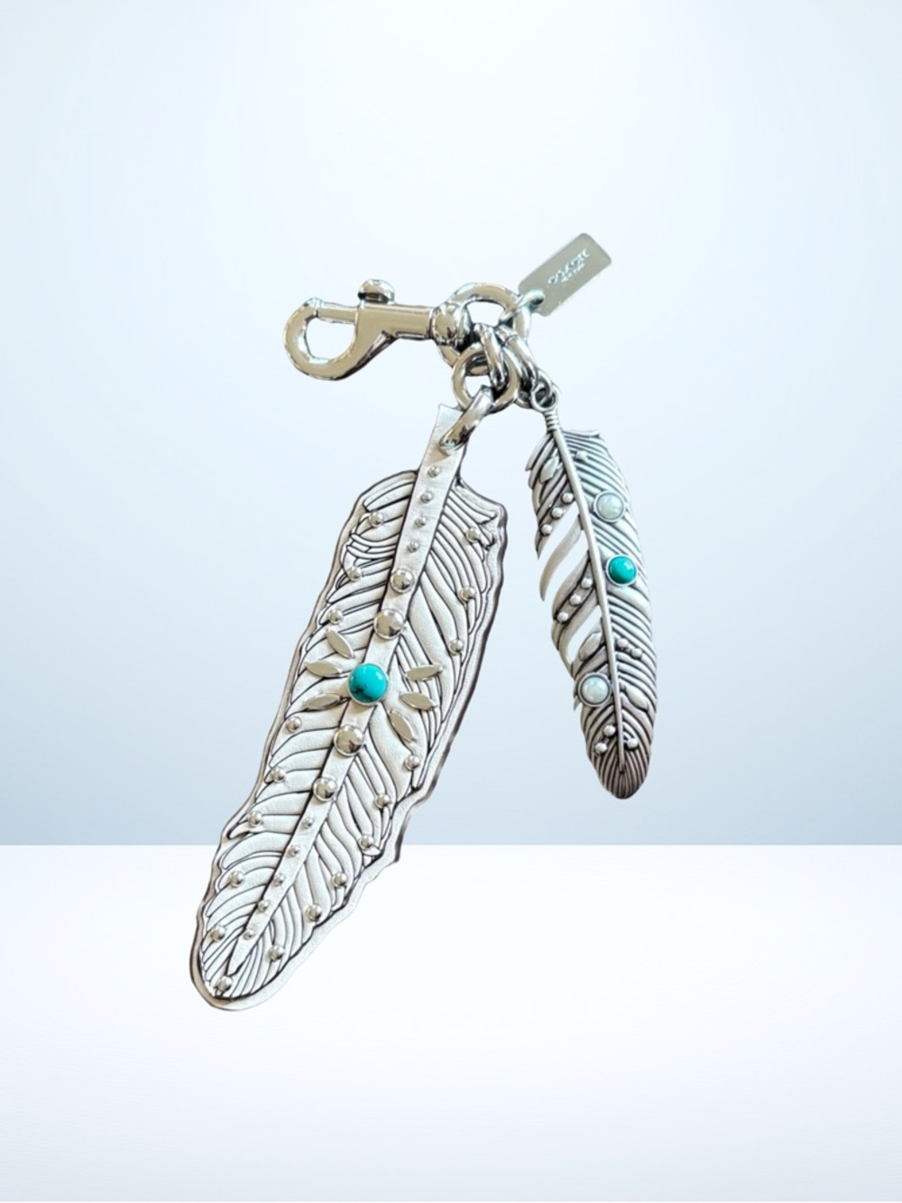 Coach 2015 Western Rivet Feather Bag Charm (White/Turquoise)
